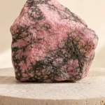 Close-up texture of Rhodonite raw stone