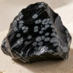 Close-up texture of Snowflake Obsidian raw stone