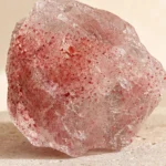 Close-up texture of Strawberry Quartz raw stone